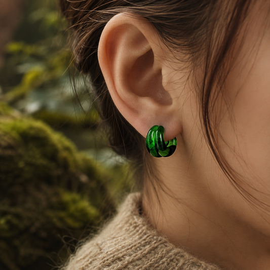 Green glass stud earrings - close-up detail