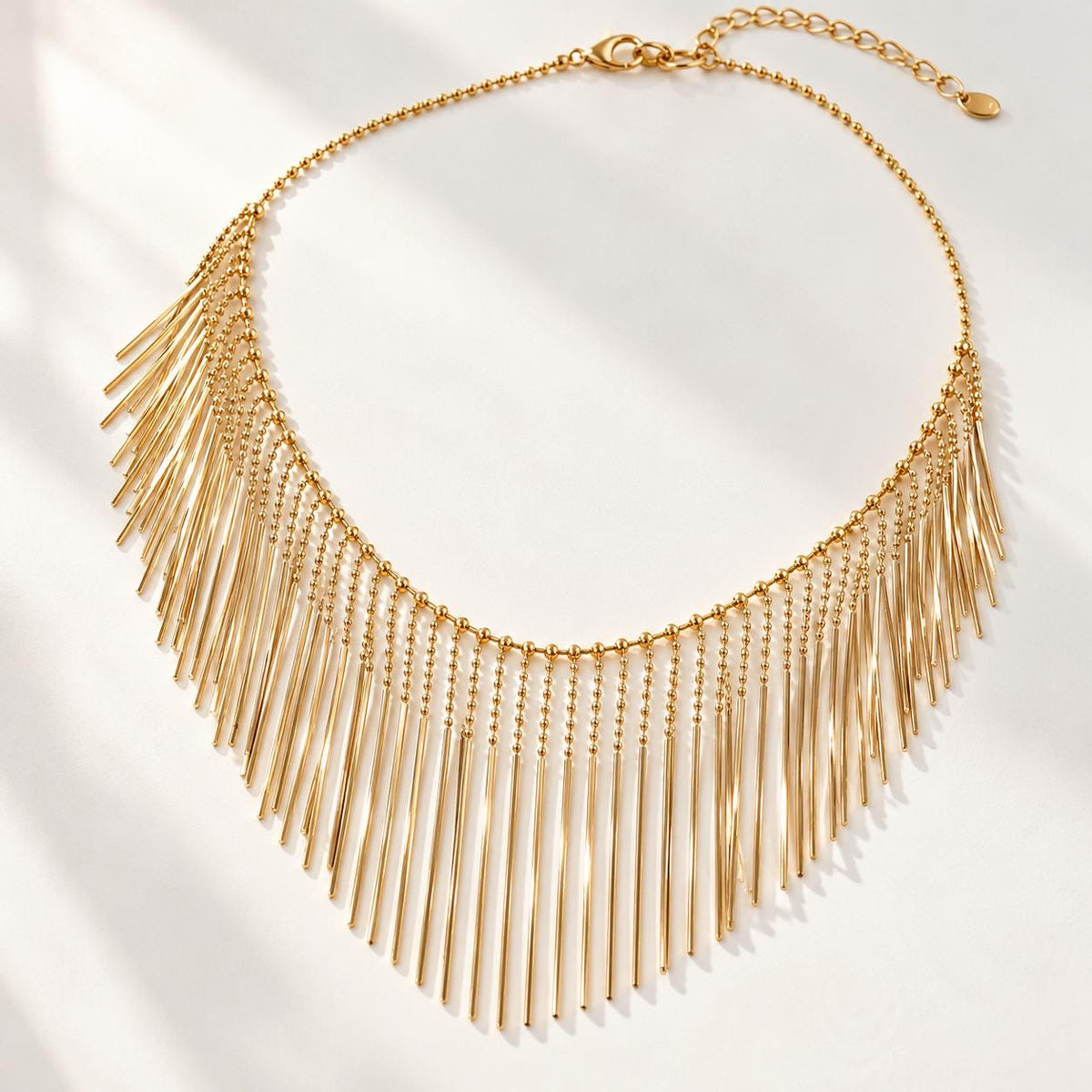 Waterfall fringe necklace clasp detail
