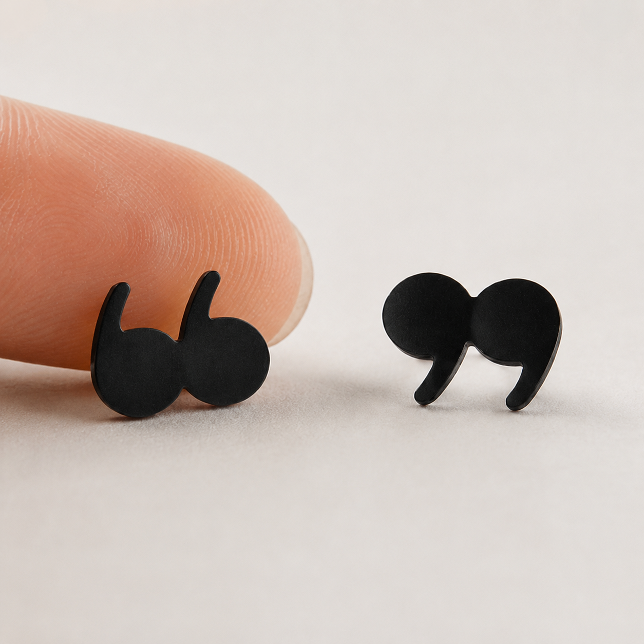 Quotation mark earrings shown on model, minimalist punctuation jewelry for book lovers - EffortlesslyUs