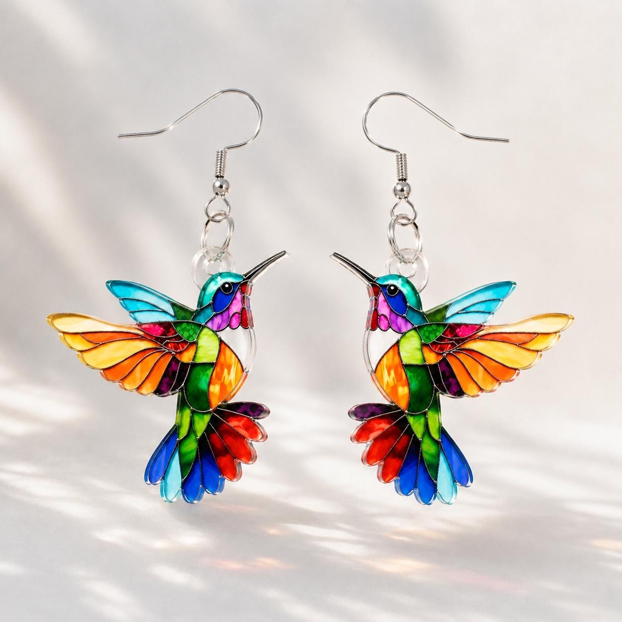 Stained glass style hummingbird dangle earrings
