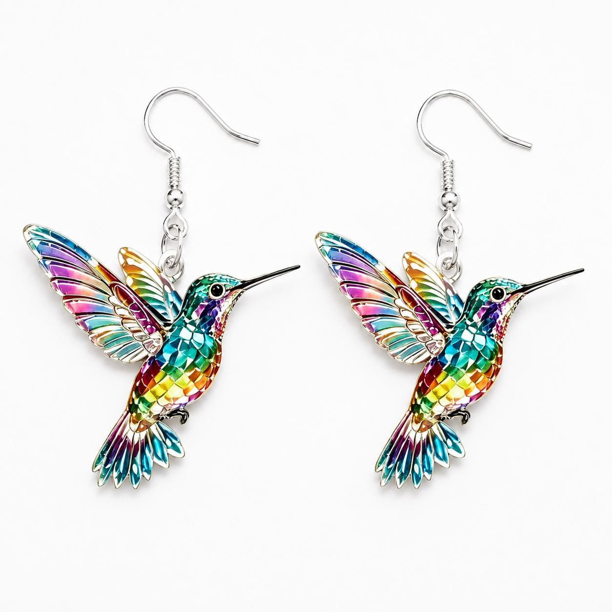 Hummingbird dangle earrings flat lay
