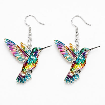 Hummingbird dangle earrings flat lay