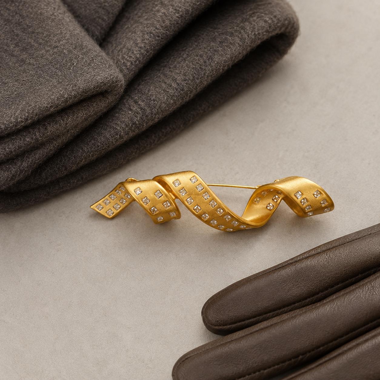 Gold spiral brooch styled look