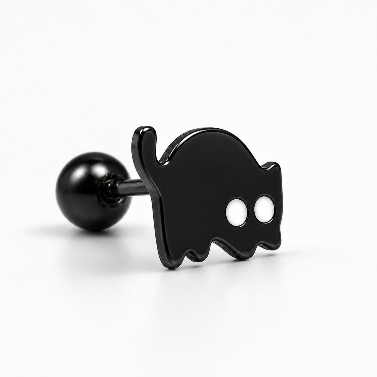 Black cat stud earrings on neutral background