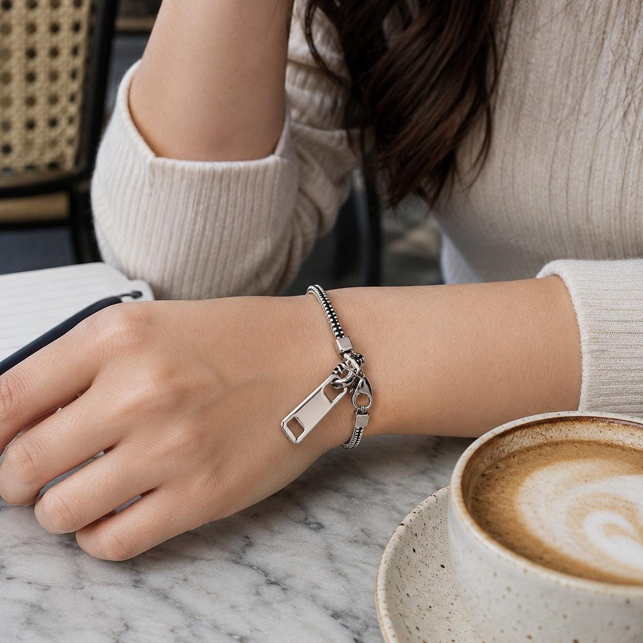 Zipper bracelet stacked with chains