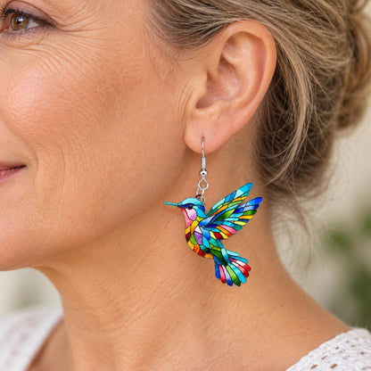Colorful hummingbird earrings flat lay