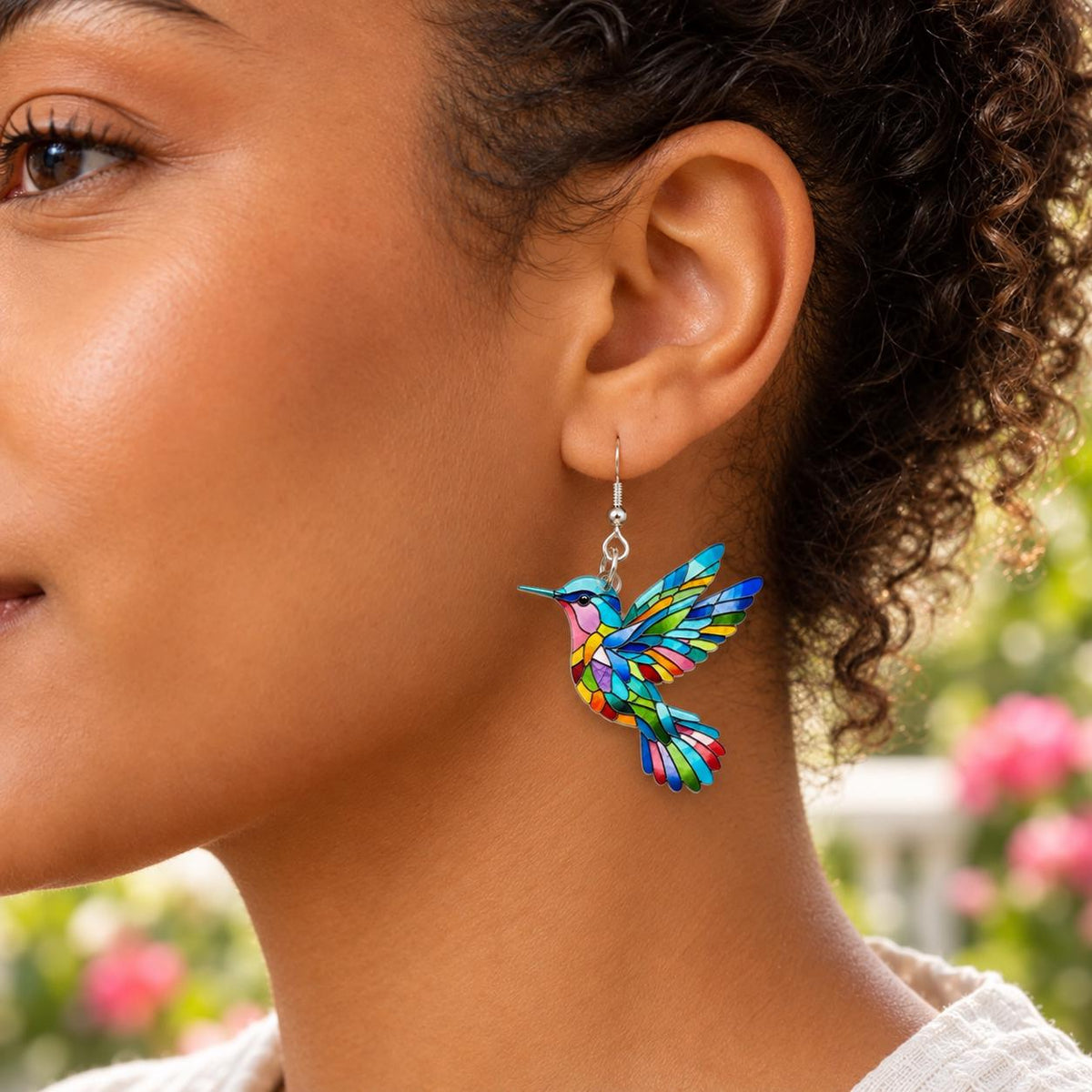 Colorful hummingbird earrings gift styling