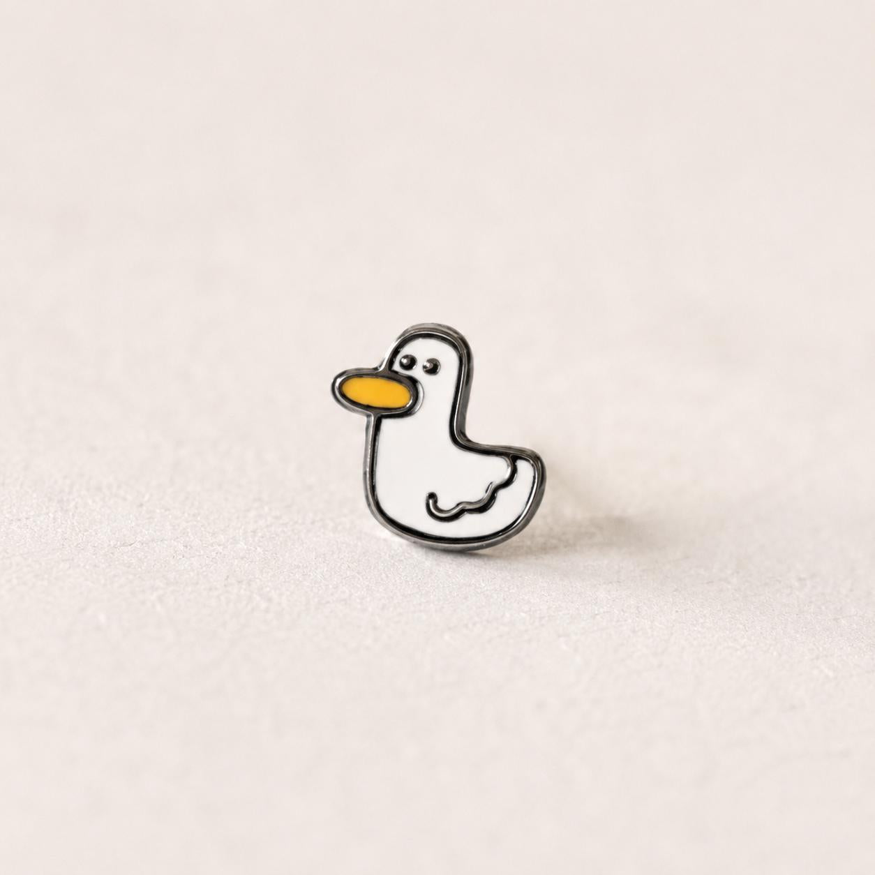 Duck stud earrings size and scale