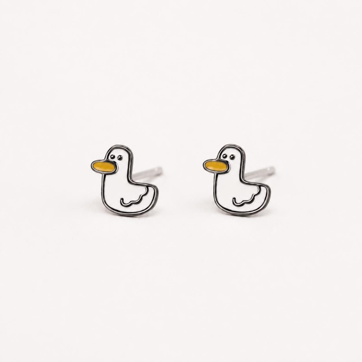 Tiny duck stud earrings in fine silver