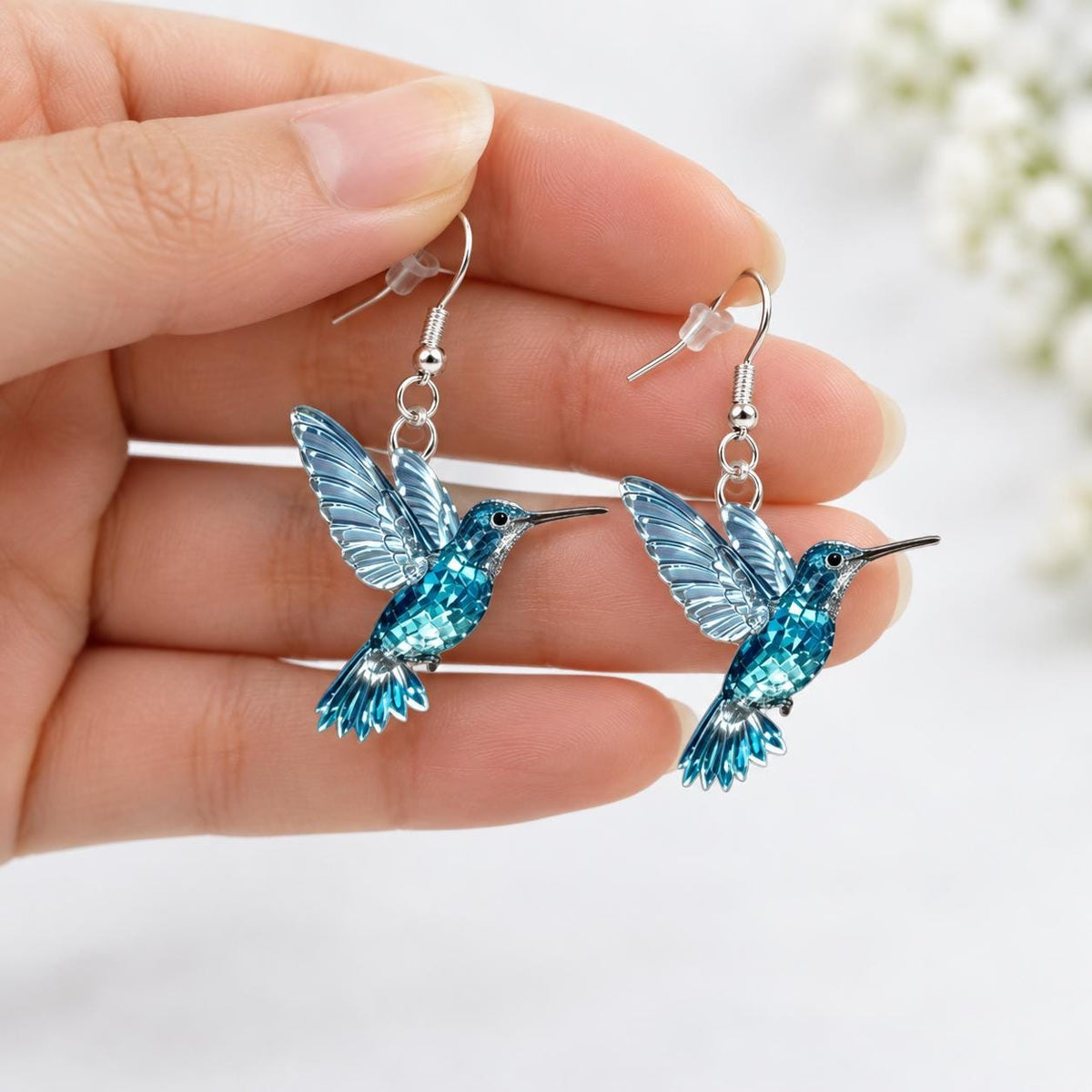 Blue hummingbird earrings french hook detail