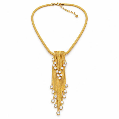 Gold tassel necklace worn on model