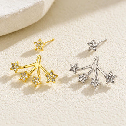 Star ear jackets on neutral background