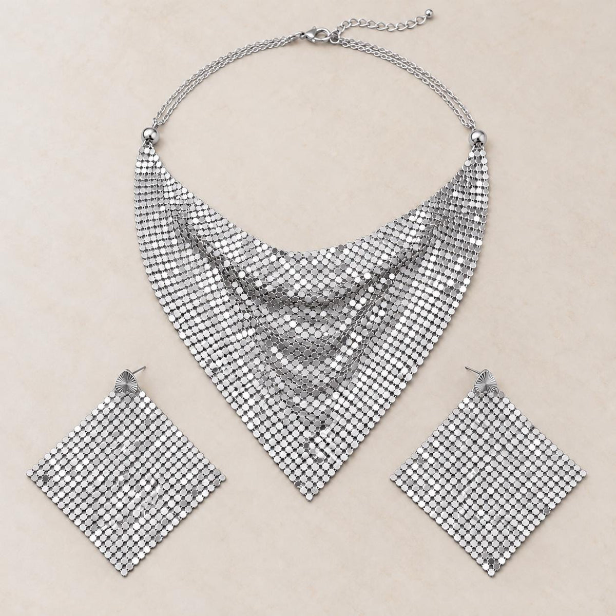 Mesh bandana necklace worn over a black top